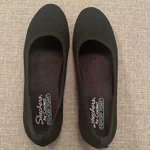 Black slip on women’s Skechers with Memory Foam